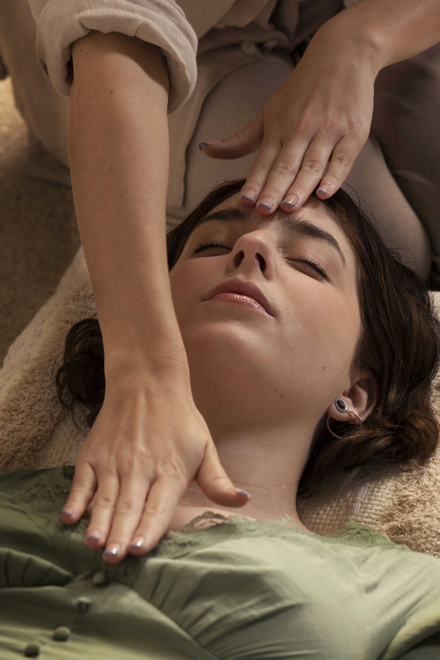 person conducting reiki therapy 1